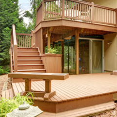 Two tier deck with handrail.